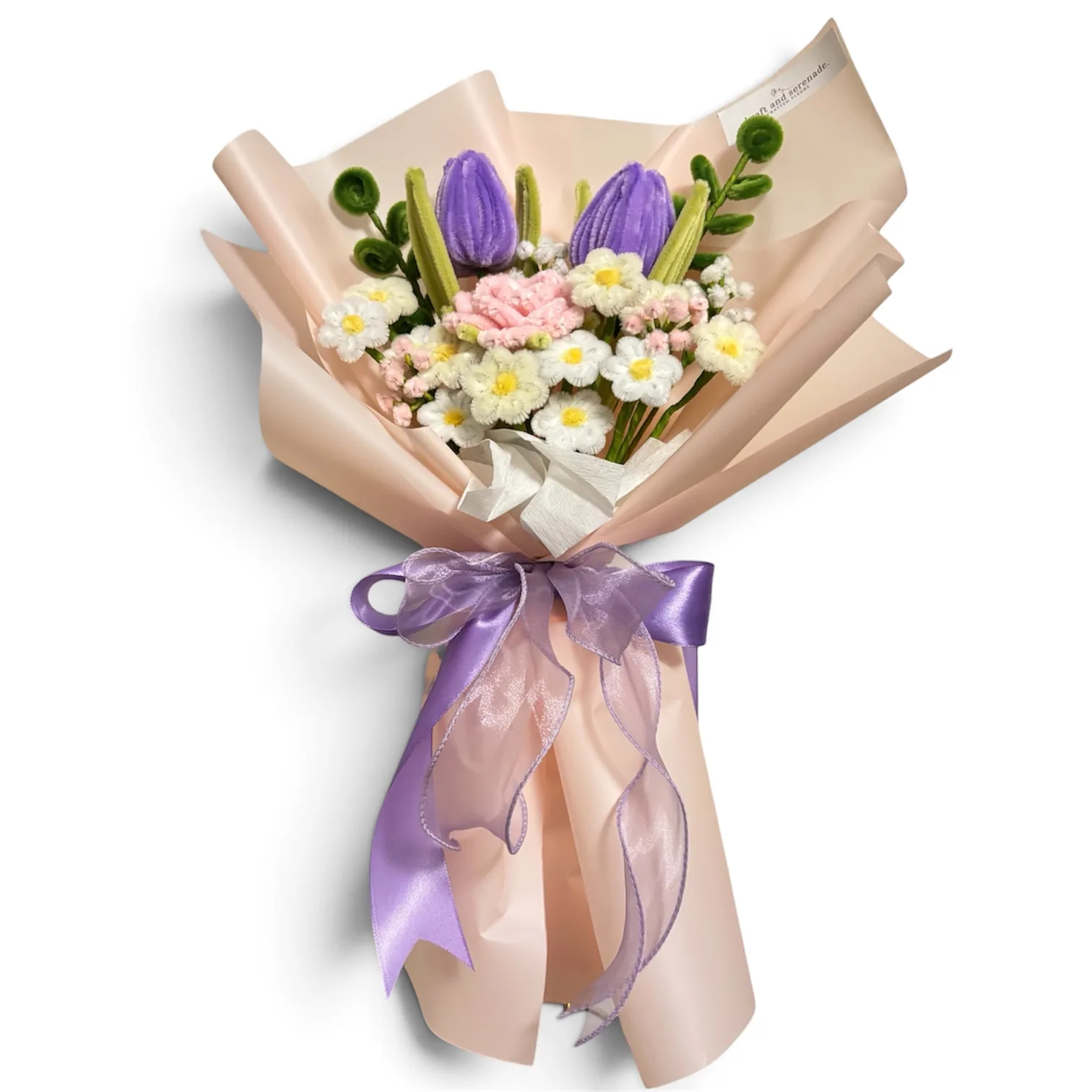 The arrangement features rose bloom, and tulip flowers, complemented by baby's breaths, mini daisies, and eucalyptus as fillers.