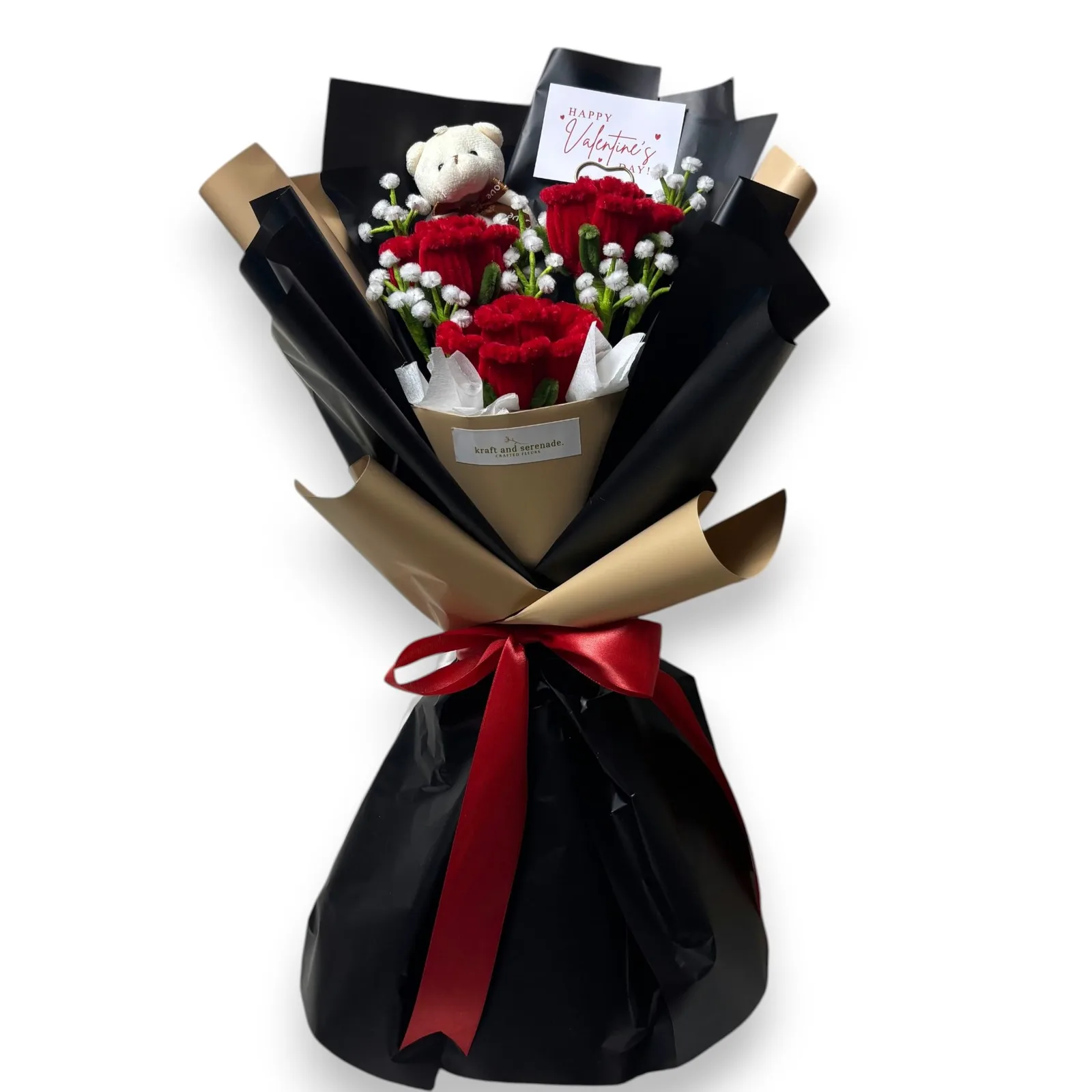 The arrangement features large roses, complemented by baby's breaths as fillers and mini bear as additional.