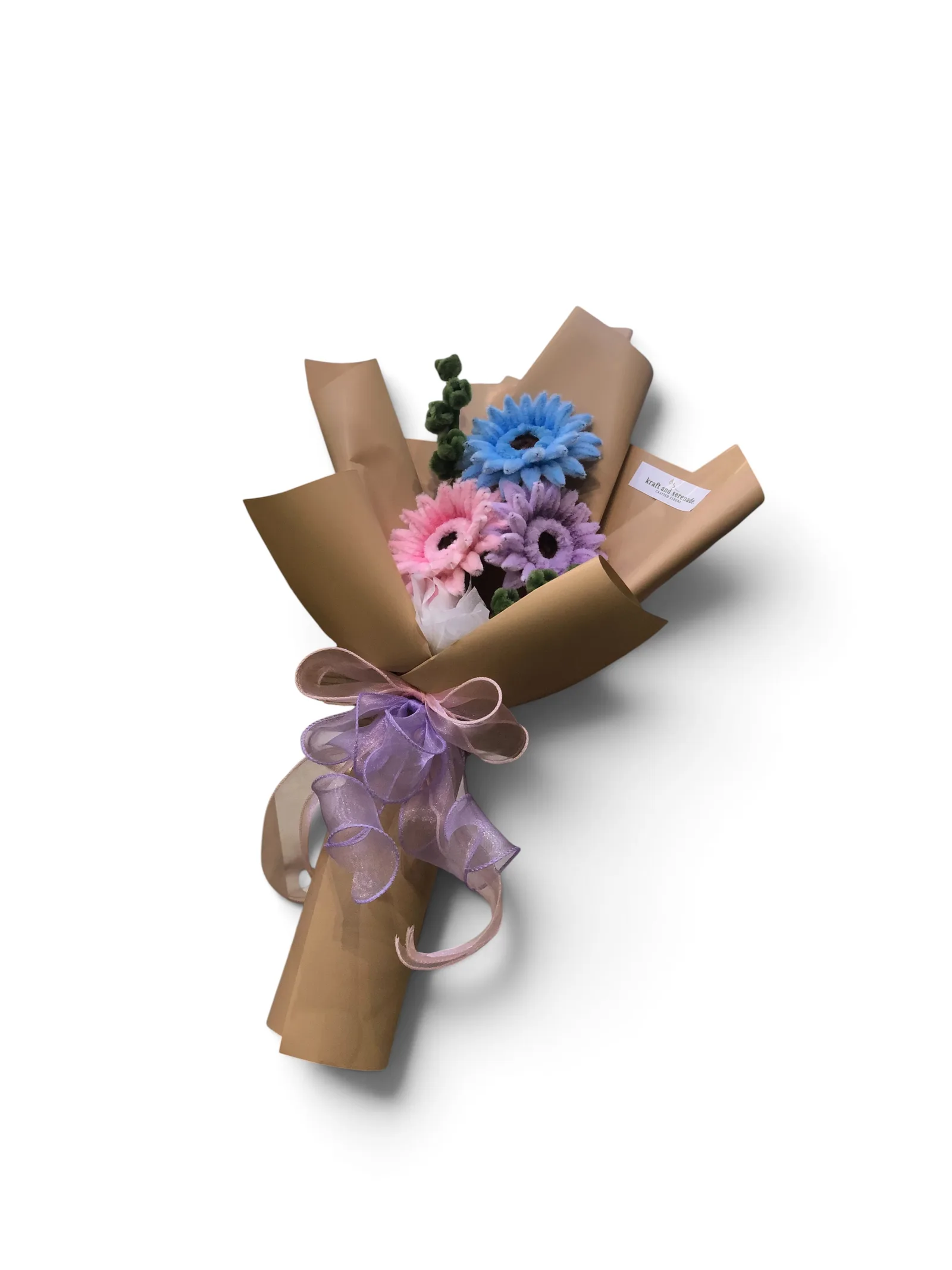 t features gerbera flowers paired with chunky eucalyptus fillers.