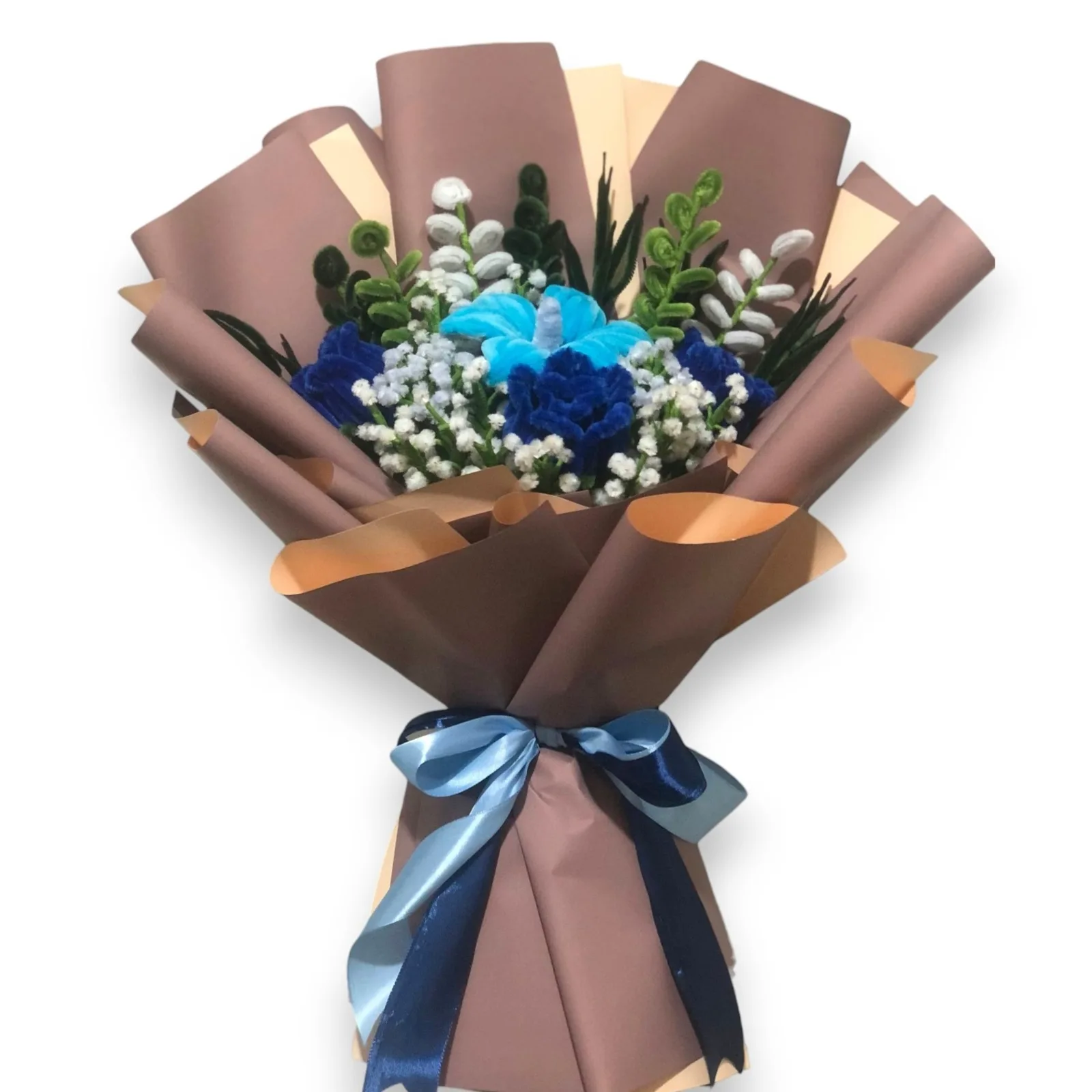 The arrangement features lily, and rose flowers, complemented by baby's breaths, eucalyptus and grass-like leaf as fillers.