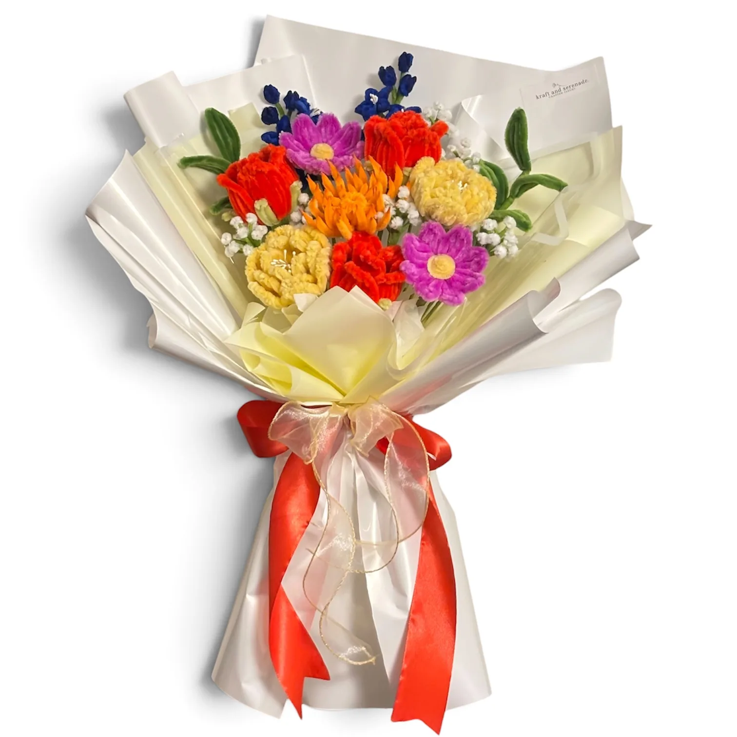 The arrangement features chrysanthemum, peonies, roses, and cosmos flowers, complemented by baby's breaths, larkspur, and ash leaves as fillers.