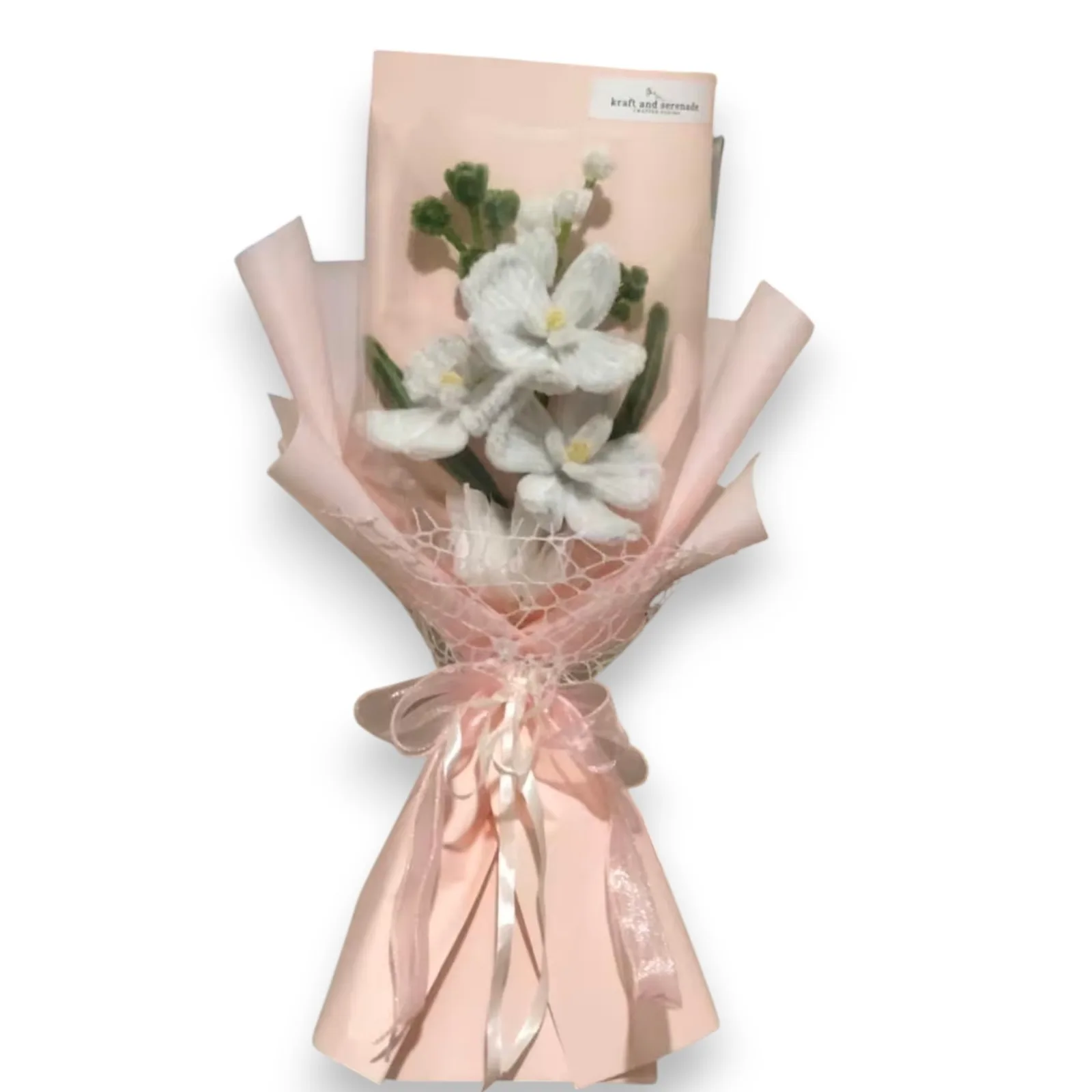 The arrangement features orchid flowers.
