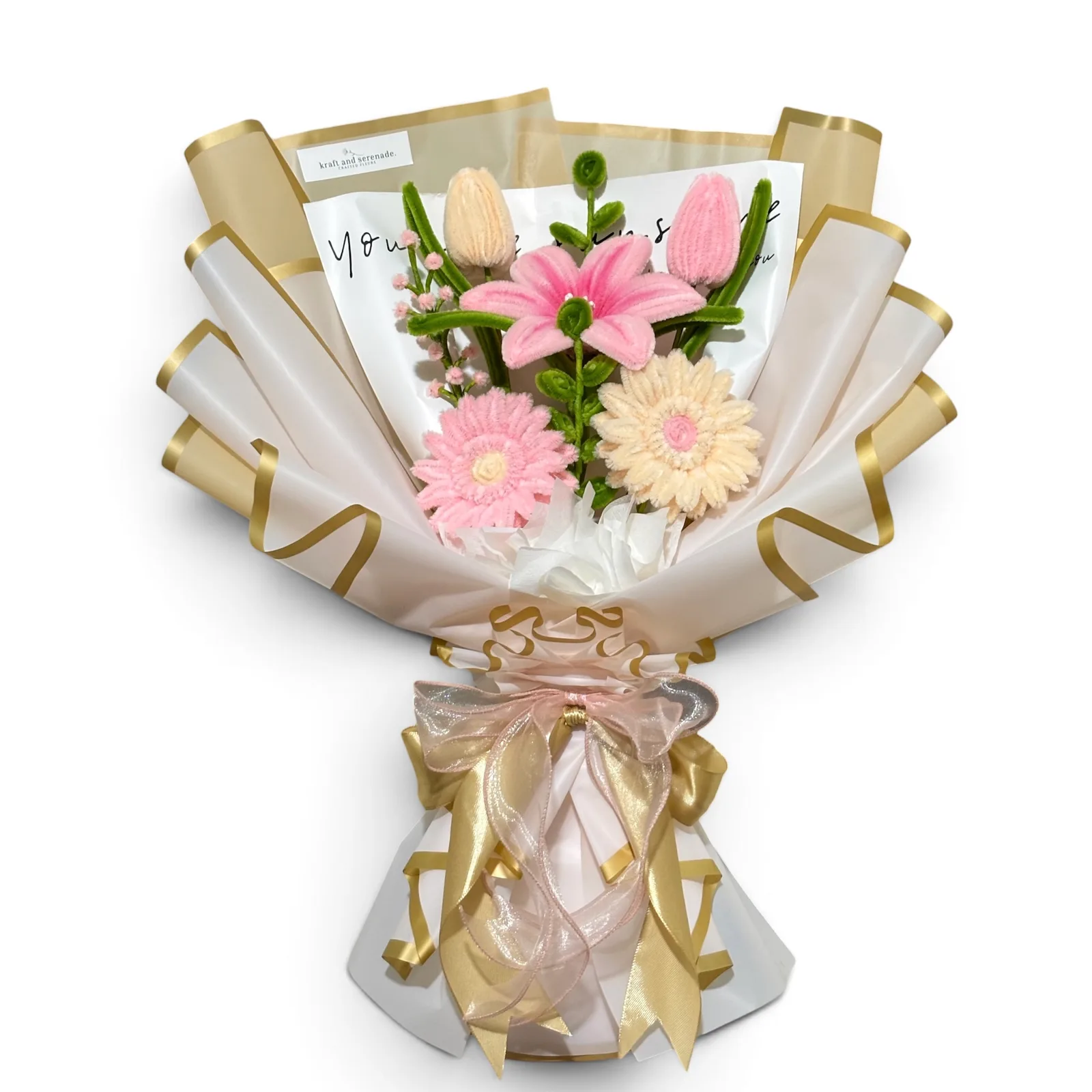 Pink signature bouquet composed of gerbera and lilies, elegantly wrapped for a romantic look.